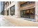 Midland Lofts entryway at 666 Seventeenth Street, featuring glass doors and stone facade at 444 17Th St # 603, Denver, CO 80202
