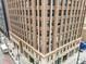 Stunning architecture showcasing the building's brick facade with views of the city at 444 17Th St # 603, Denver, CO 80202