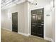 Hallway view with neutral walls, carpet and unit door number 603 at the Midland Lofts at 444 17Th St # 603, Denver, CO 80202