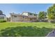 Picture of a large backyard with a manicured lawn, patio area, and a cozy outdoor dining space, great for relaxing at 13266 Canopus Dr, Lone Tree, CO 80124