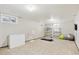 Spacious basement area, ideal for fitness, showcasing ample natural light and neutral carpeting at 13266 Canopus Dr, Lone Tree, CO 80124