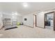 Large finished basement with neutral carpet that offers versatility for home gym, play area or second living space at 13266 Canopus Dr, Lone Tree, CO 80124