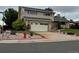 Charming two-story home boasts a well-maintained yard, complemented by tasteful landscaping and a convenient two-car garage at 13266 Canopus Dr, Lone Tree, CO 80124