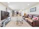 Spacious living room featuring stairs to upper floor and an open floor plan at 13266 Canopus Dr, Lone Tree, CO 80124