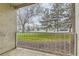 Balcony with views of street and neighborhood beyond a white metal safety railing at 5875 E Iliff Ave # 115, Denver, CO 80222