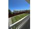 This backyard features newly installed sod, a gravel border, and a privacy fence, perfect for outdoor entertaining at 180 N Edge Cliff St, Castle Rock, CO 80104