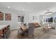 Open concept living space, blending the dining area, living room, and kitchen for seamless entertaining at 180 N Edge Cliff St, Castle Rock, CO 80104