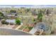An aerial view of a neighborhood with mature trees and well-maintained homes at 5481 E Tennessee Ave, Denver, CO 80246