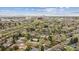 Wide aerial shot showcases the neighborhood with city skyline in the distance at 5481 E Tennessee Ave, Denver, CO 80246