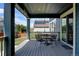 Outdoor deck with a seating area, perfect for relaxing or entertaining at 10733 Salida St, Commerce City, CO 80022