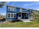 Exterior view of home with a covered porch and landscaped backyard at 10733 Salida St, Commerce City, CO 80022