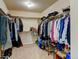 Walk-in closet with ample storage for clothing and shoes, offering a convenient organization solution at 10733 Salida St, Commerce City, CO 80022