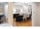 Bright dining room showcasing tray ceiling, stylish furniture, and natural light from large windows at 2552 E Alameda Ave # 32, Denver, CO 80209