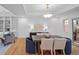 Elegant dining room with sophisticated lighting, modern furnishings, and a bright, inviting atmosphere at 2552 E Alameda Ave # 32, Denver, CO 80209