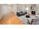 Inviting living room boasts hardwood floors, fireplace, and ample space for entertaining at 2552 E Alameda Ave # 32, Denver, CO 80209