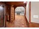 Office space with wood flooring, arched doorway, and built-in shelving and desk space at 2552 E Alameda Ave # 32, Denver, CO 80209