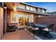 Outdoor patio with brick paving, a dining set, and a charming brick wall surround at 2552 E Alameda Ave # 32, Denver, CO 80209