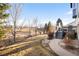 Expansive backyard with a well-maintained lawn, pathway, and inviting deck for outdoor enjoyment at 1870 Alpine Dr, Erie, CO 80516