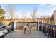 Outdoor deck with grill, perfect for entertaining and enjoying the scenic neighborhood views at 1870 Alpine Dr, Erie, CO 80516