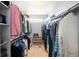 Organized walk-in closet with ample storage space and neutral colors at 1870 Alpine Dr, Erie, CO 80516