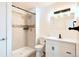 Contemporary bathroom showcasing a walk-in shower, modern vanity, and neutral tones at 8627 Santa Fe Dr, Thornton, CO 80260
