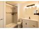 Stylish bathroom includes a vanity, sleek fixtures, and a glass-enclosed shower at 8627 Santa Fe Dr, Thornton, CO 80260