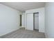 Spacious bedroom features new paint and carpet and sliding-door closet at 8627 Santa Fe Dr, Thornton, CO 80260