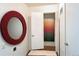 Inviting hallway with stylish decor and storage closet at 8627 Santa Fe Dr, Thornton, CO 80260