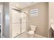 Clean bathroom showcases a glass enclosed shower with a neutral color palette at 764 N Quatar St, Aurora, CO 80018