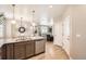 Bright kitchen includes stainless dishwasher, granite countertops and overlooks the living area at 764 N Quatar St, Aurora, CO 80018