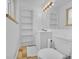 Bathroom featuring tile floors, a vanity, and built-in shelving for storage at 61 S 17Th Avdr, Brighton, CO 80601
