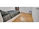 Serene bedroom with hardwood floors and a comfortable bed at 61 S 17Th Avdr, Brighton, CO 80601