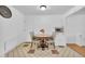 Cozy eat-in kitchen area with a charming table setting and a view of the backyard at 61 S 17Th Avdr, Brighton, CO 80601
