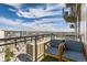 Cozy balcony seating area with panoramic views of the cityscape at 2001 Lincoln St # 2213, Denver, CO 80202
