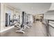 Bright and spacious gym featuring state-of-the-art exercise machines and mirrored walls at 2001 Lincoln St # 2213, Denver, CO 80202