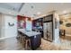 Modern kitchen with stainless steel appliances and a granite island at 2001 Lincoln St # 2213, Denver, CO 80202