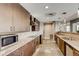 Modern kitchen with stainless steel appliances, granite countertops and ample cabinetry at 2001 Lincoln St # 2213, Denver, CO 80202