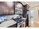 Contemporary kitchen with stainless steel appliances and ample counter space at 2001 Lincoln St # 2213, Denver, CO 80202