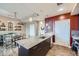Well-appointed kitchen island featuring granite counters and sleek, dark wood cabinets at 2001 Lincoln St # 2213, Denver, CO 80202
