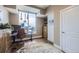 Bright office space with a large window offering city views and custom shelving at 2001 Lincoln St # 2213, Denver, CO 80202