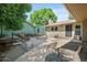 Great backyard featuring a patio with seating and fire pit, along with a hammock at 7552 Nikau Dr, Niwot, CO 80503