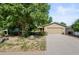 Inviting single-Gathering home with an attached two-car garage and lush landscaping and beautiful mature trees at 7552 Nikau Dr, Niwot, CO 80503