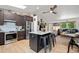 Beautiful open kitchen with a large island, modern appliances, and plenty of counter space for cooking at 7552 Nikau Dr, Niwot, CO 80503