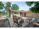 Cozy patio space with seating and fire pit provides a serene outdoor retreat at 7552 Nikau Dr, Niwot, CO 80503