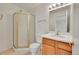 Bathroom with a stand-up shower, vanity, and light fixtures at 3294 Sentinel Dr, Boulder, CO 80301