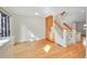 Bright kitchen area with natural lighting, hardwood floors, and staircase access at 3294 Sentinel Dr, Boulder, CO 80301