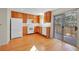 Well-lit kitchen with wood cabinetry, modern appliances, and backyard access at 3294 Sentinel Dr, Boulder, CO 80301