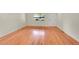 Spacious living room featuring hardwood floors, a large window, and neutral paint at 3294 Sentinel Dr, Boulder, CO 80301