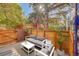 Back patio features outdoor seating creating a welcoming entertaining space at 3294 Sentinel Dr, Boulder, CO 80301