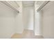 A walk-in closet offers ample storage space with shelving and neutral carpeting at 3294 Sentinel Dr, Boulder, CO 80301